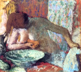 Woman at her Toilette 1897 by Edgar Degas