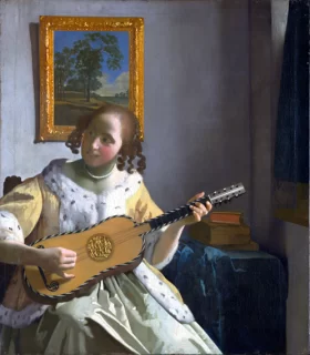 Young woman playing a guitar by Johannes Vermeer