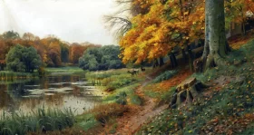 Autumnal wooded river landscape with deer, 1918 by Peder Mørk Mønsted